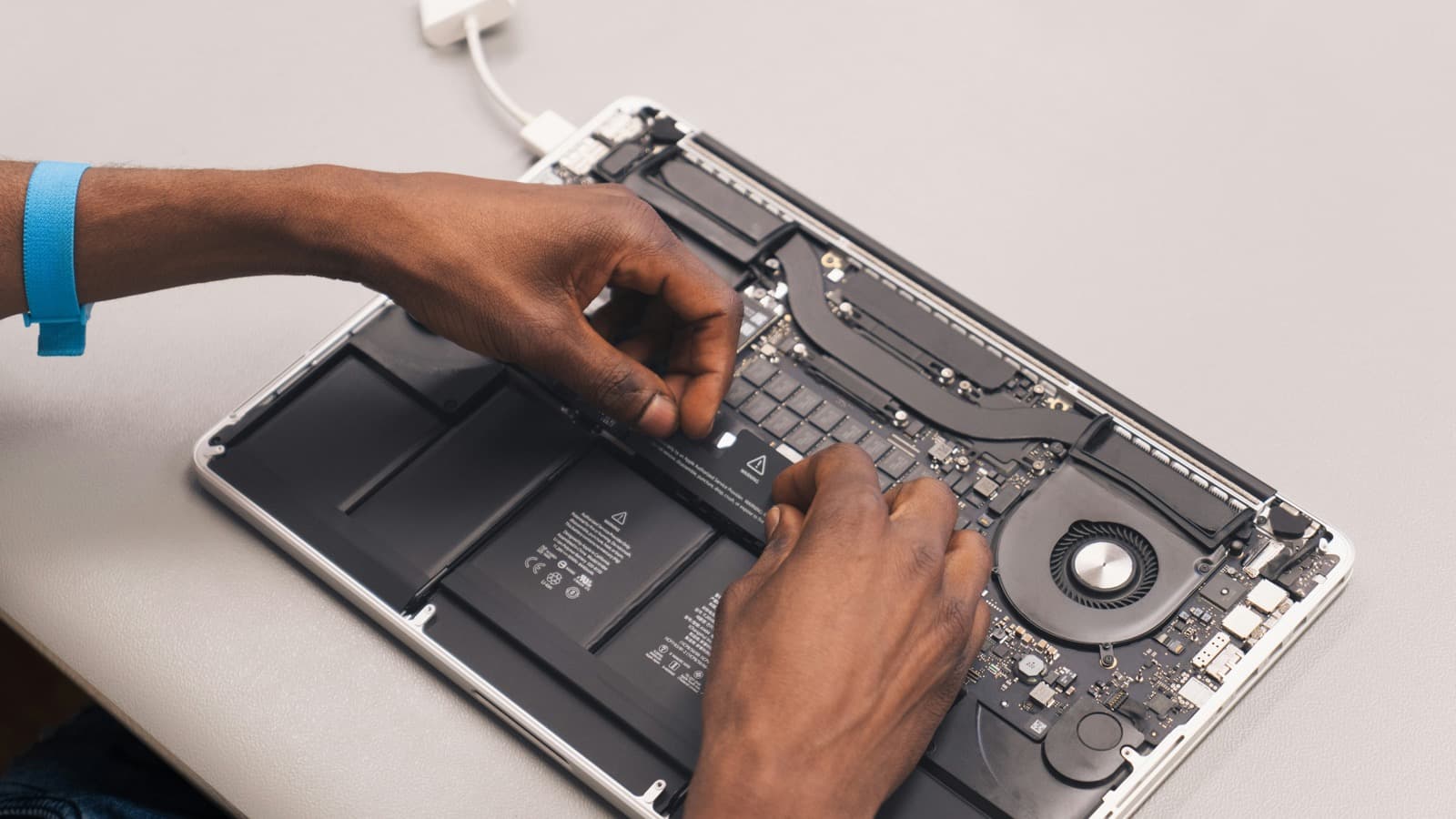Mac repair specialist at work - We Repair Mac London